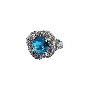 Bomb Party Ring , size 6, blue round stone on a silver band